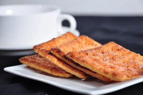 Stack of cracker on the white plate Stock Photos