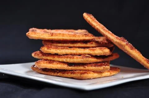 Stack of cracker on the white plate Stock Photos