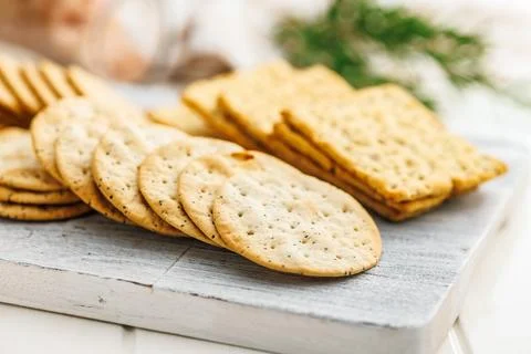 A stack of crackers neatly arranged on a tabletop. 写真素材