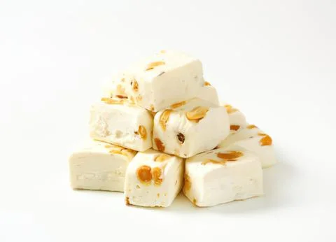 Stack of creamy nutty dessert cubes Stock Photos