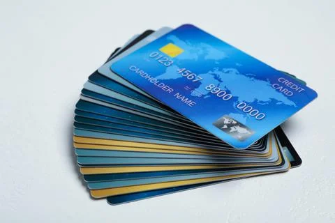 Stack of credit cards on white table 스톡 사진