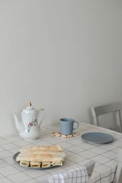 Stack of crepes on kitchen table. Pancakes for breakfast, food photography Stock Photos
