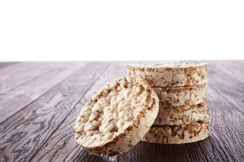 Stack of crispbreads on dark wooden table Foto stock