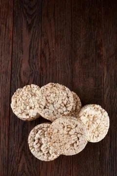 Stack of crispbreads on dark wooden table Foto stock
