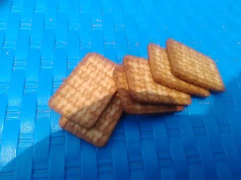 Stack of crispy golden brown cookies. 스톡 사진