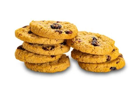 Stack of crispy homemade oat flakes and cranberry biscuits. Stock Photos