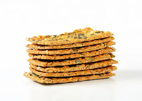 Stack of crunchy granola crackers with herbs Stock Photos