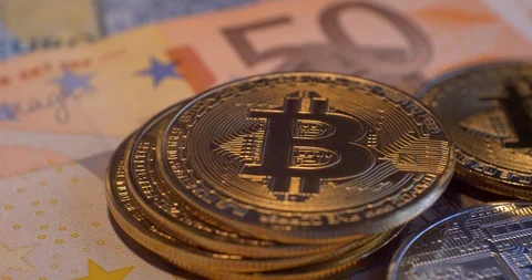 Stack of cryptocurrencies , bitcoin 4K, EUR, silver bitcoin backside Stock Footage 85515727