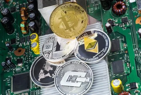 Stack of cryptocurrencies: bitcoin, ethereum, litecoin, dash, and ripple coin Stock Photos