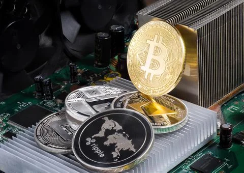Stack of cryptocurrencies: bitcoin, ethereum, litecoin, dash, and ripple Stock Photos