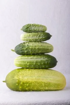 A stack of cucumbers on top of each other Stock Photos