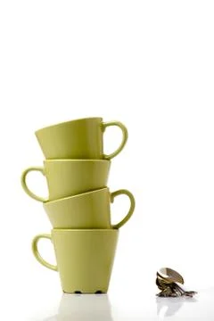 A stack of cups and spoons Stock Photos