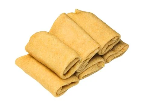 Stack of curled fried delicious golden brown pancakes Stock Photos