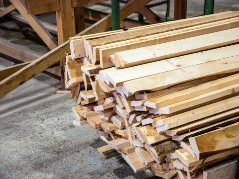 Stack of Cut Wooden Planks and Lumber in Sawmill Workshop Stock Photos