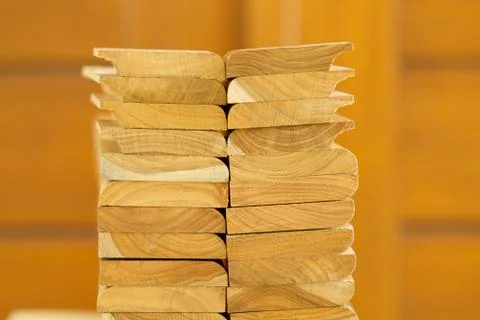 Stack of cutted solid teak wood with wooden background Stock Photos