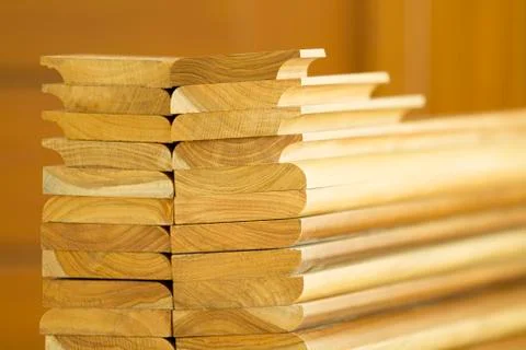 Stack of cutted solid teak wood with wooden background Stock Photos