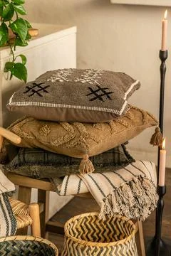 Stack of Decorative Rustic Pillows with Boho Textures and Embroidery Stock Photos