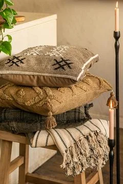 Stack of Decorative Rustic Pillows with Boho Textures and Embroidery Stock Photos