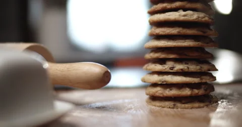 Stack of delicious chocolate chip cookies in home kitchen 스톡 동영상 138543046