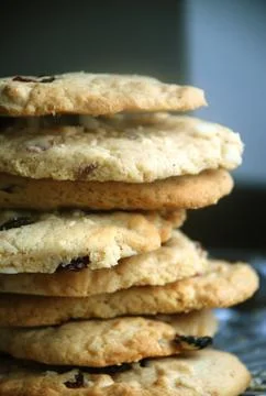 Stack of delicious chocolate chip cookies on a black background Stock Photos