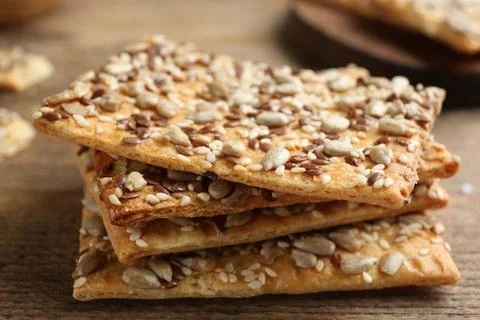 Stack of delicious crackers on table, closeup Stock Photos
