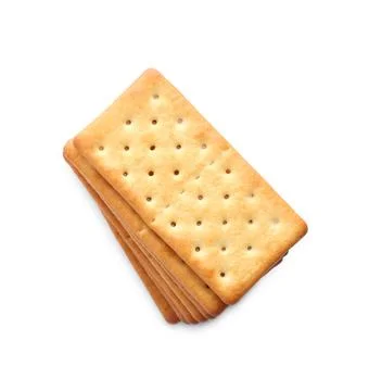 Stack of delicious crispy crackers isolated on white, top view 写真素材