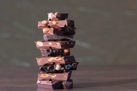 Stack of delicious looking chocolate chunks with nuts Stock Photos