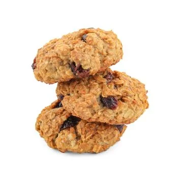 Stack of delicious oatmeal cookies with dried cranberries and nuts isolated.. Stock Photos