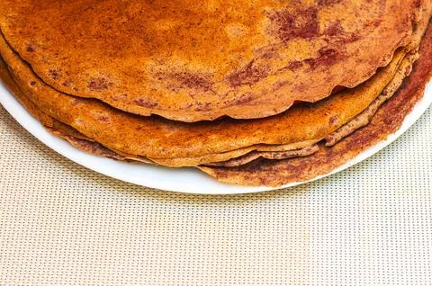 Stack of delicious pancakes on a white plate, ready to be eaten Stock Photos