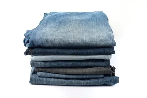 Stack of Denims on White Background Stock Photos