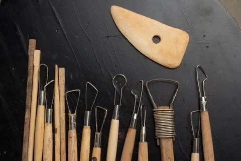The stack device tool for sculpting of the sculptor on a black background 스톡 사진
