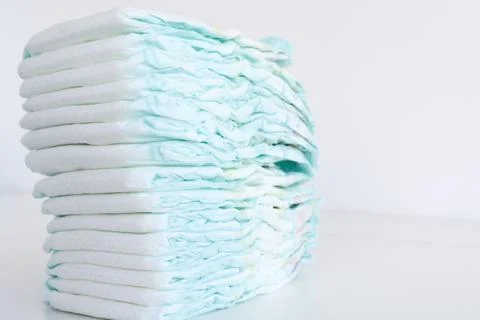 Stack of diapers isolated on white background Fotos Stock