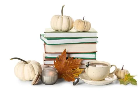 Stack of different books with burning candle, decorative pumpkins, cup of coc Stock Photos