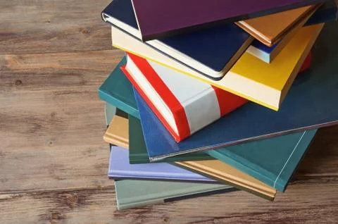 Stack of different books. Free space for text Stock Photos