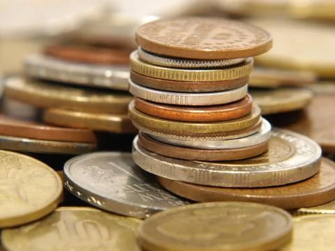 Stack of different coins. Stock Photos
