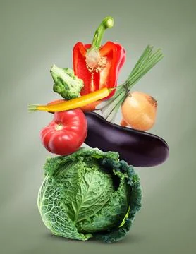 Stack of different fresh vegetables on green grey background 스톡 사진