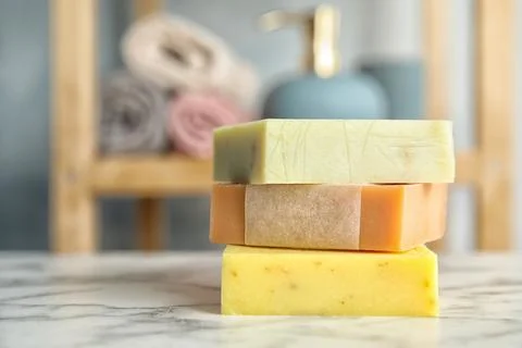 Stack of different handmade soap bars on table. Space for text 스톡 사진