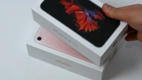 Stack of different iPhones 4, 5s, 6s, and others. A series of phones from Stock Footage 168379187