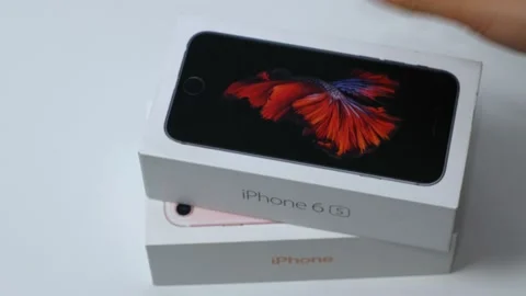 Stack of different iPhones 4, 5s, 6s, and others. A series of phones from Stock Footage 168379202