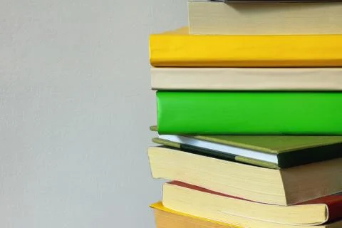 Stack of different multi-colored books. Copy space Stock Photos