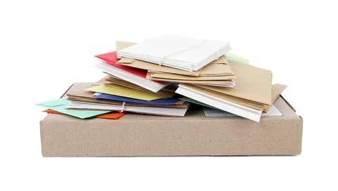 Stack of different paper envelopes and parcel on white background. Post offic Foto stock