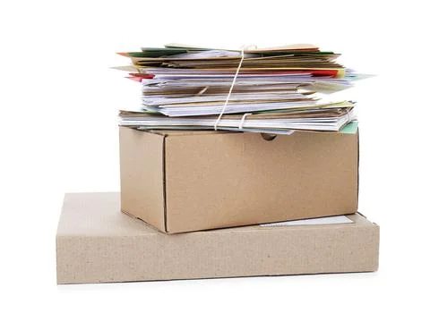 Stack of different paper envelopes and parcels on white background. Post offi Foto stock