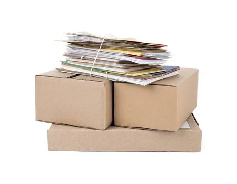 Stack of different paper envelopes and parcels on white background. Post offi Foto stock