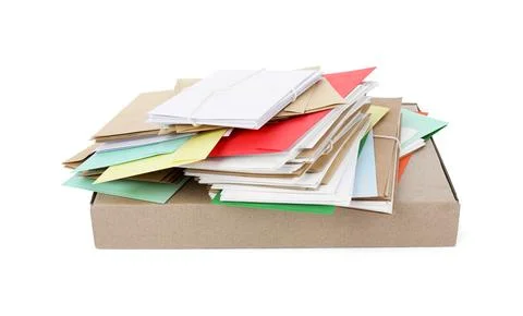 Stack of different paper envelopes and parcel on white background. Post offic Stock Photos