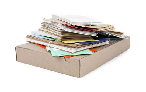 Stack of different paper envelopes and parcel on white background. Post offic Stock Photos