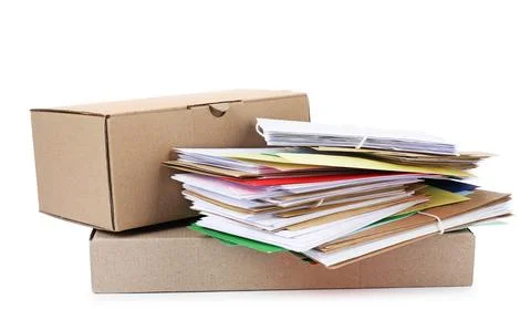 Stack of different paper envelopes and parcels on white background. Post offi Foto stock