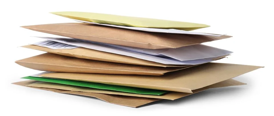 Stack of different paper envelopes isolated on white. Post office Foto stock