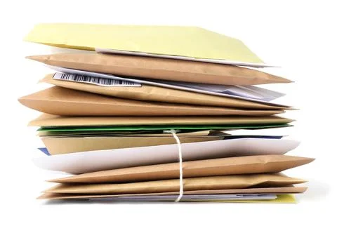 Stack of different paper envelopes isolated on white. Post office Foto stock