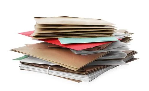 Stack of different paper envelopes on white background. Post office Foto stock