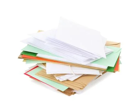 Stack of different paper envelopes on white background. Post office Foto stock